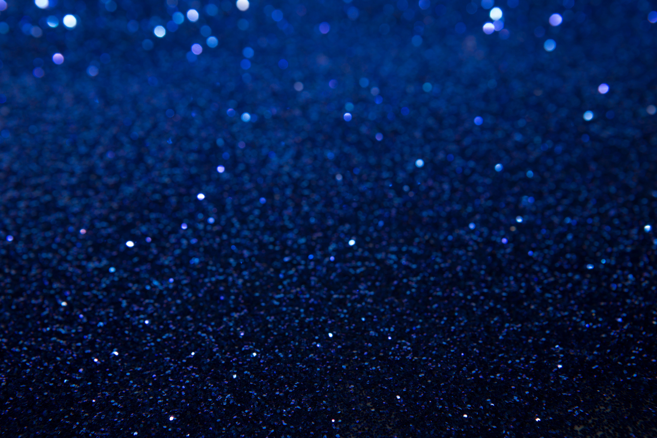 Abstract blue sparkle glitter background